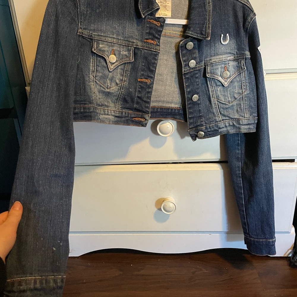 Jean jacket with a horseshoe